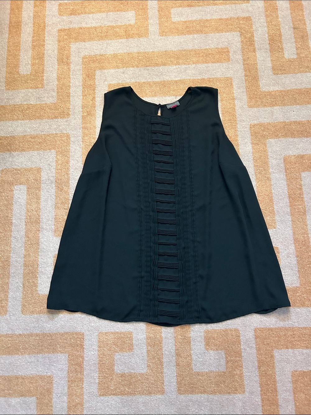 Women’s Black Sleeveless Pleated Front top